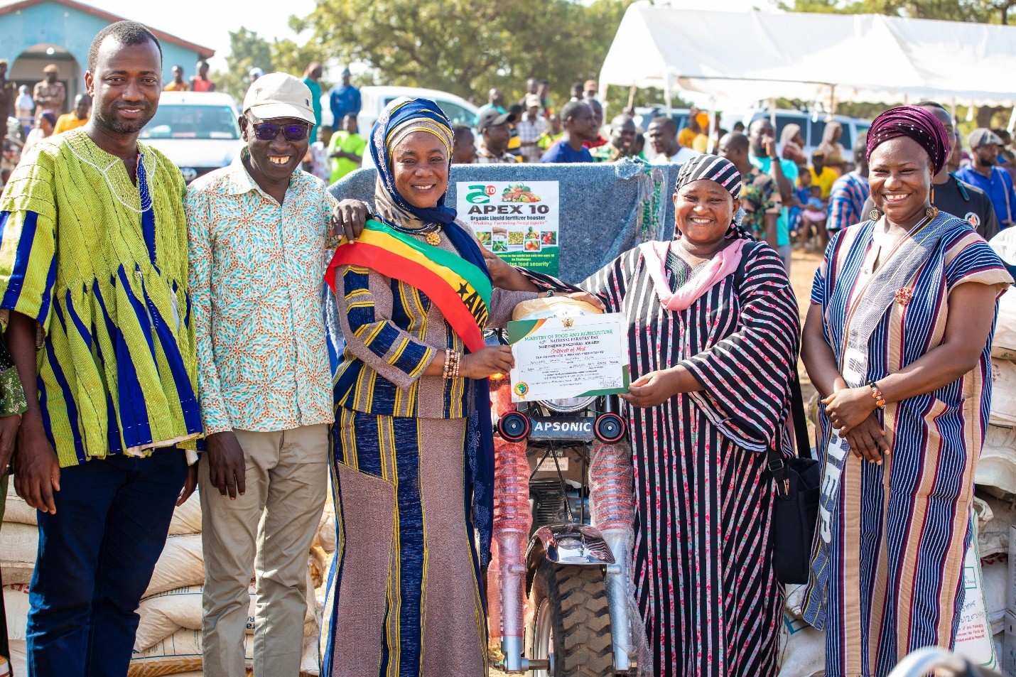 Women accept award at National Farmers Day Celebration in Ghana.